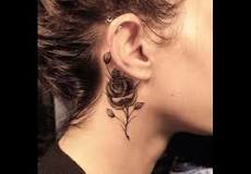 significado cruz tatuaje cuello